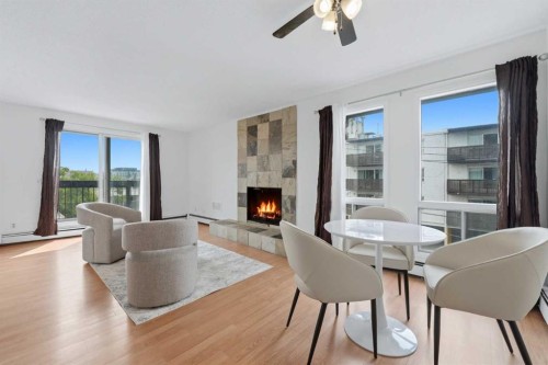 306-2611 15A Street Sw, Calgary, AB - Indoor With Fireplace