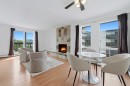 306-2611 15A Street Sw, Calgary, AB  - Indoor With Fireplace 
