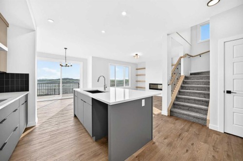 199 Langwell Common Se, Airdrie, AB - Indoor Photo Showing Kitchen With Upgraded Kitchen