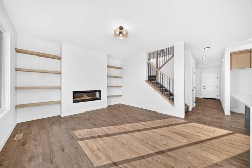 199 Langwell Common Se, Airdrie, AB - Indoor With Fireplace