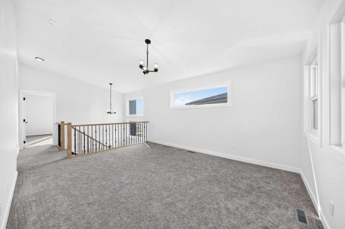 199 Langwell Common Se, Airdrie, AB - Indoor Photo Showing Other Room