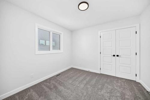 199 Langwell Common Se, Airdrie, AB - Indoor Photo Showing Other Room