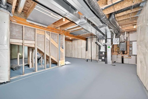 199 Langwell Common Se, Airdrie, AB - Indoor Photo Showing Basement