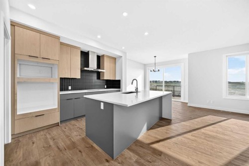 199 Langwell Common Se, Airdrie, AB - Indoor Photo Showing Kitchen With Upgraded Kitchen