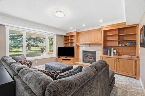 12078 Diamond View Se, Calgary, AB - Indoor Photo Showing Living Room With Fireplace