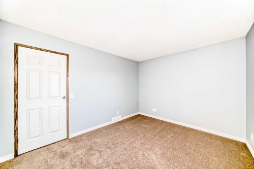 77 Martinbrook Road Ne, Calgary, AB - Indoor Photo Showing Other Room