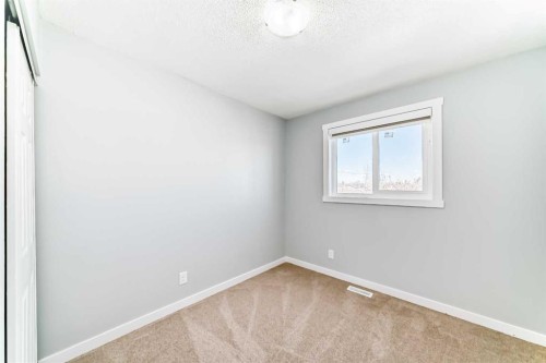 77 Martinbrook Road Ne, Calgary, AB - Indoor Photo Showing Other Room