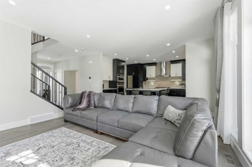 74 Alpine Gardens Sw, Calgary, AB - Indoor Photo Showing Living Room