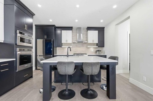 74 Alpine Gardens Sw, Calgary, AB - Indoor Photo Showing Kitchen With Stainless Steel Kitchen With Upgraded Kitchen