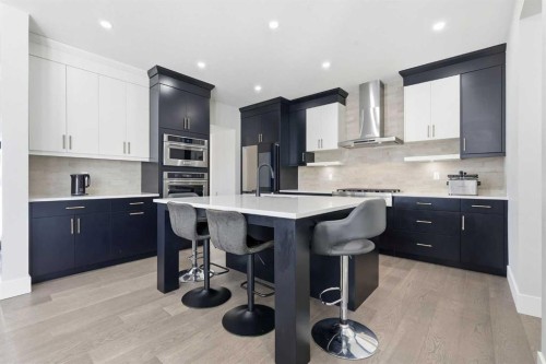 74 Alpine Gardens Sw, Calgary, AB - Indoor Photo Showing Kitchen With Upgraded Kitchen