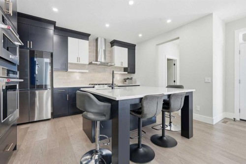 74 Alpine Gardens Sw, Calgary, AB - Indoor Photo Showing Kitchen With Stainless Steel Kitchen With Upgraded Kitchen