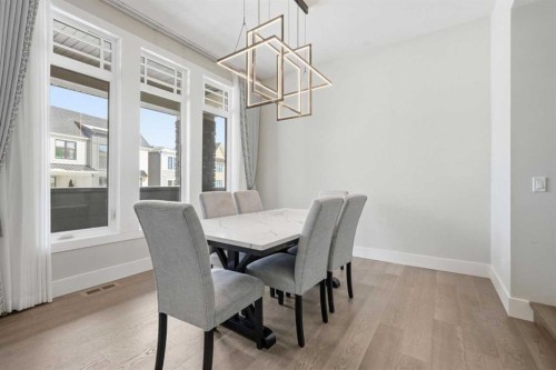 74 Alpine Gardens Sw, Calgary, AB - Indoor Photo Showing Dining Room