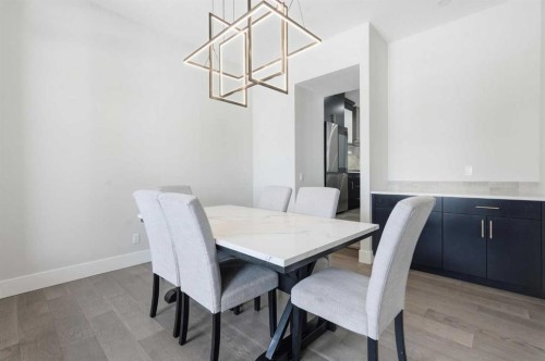 74 Alpine Gardens Sw, Calgary, AB - Indoor Photo Showing Dining Room