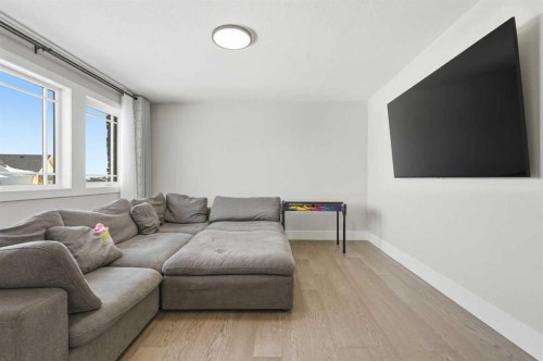 74 Alpine Gardens Sw, Calgary, AB - Indoor Photo Showing Living Room
