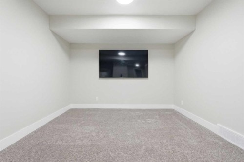 74 Alpine Gardens Sw, Calgary, AB - Indoor Photo Showing Other Room