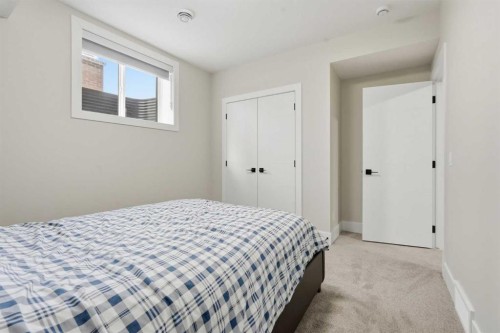 74 Alpine Gardens Sw, Calgary, AB - Indoor Photo Showing Bedroom