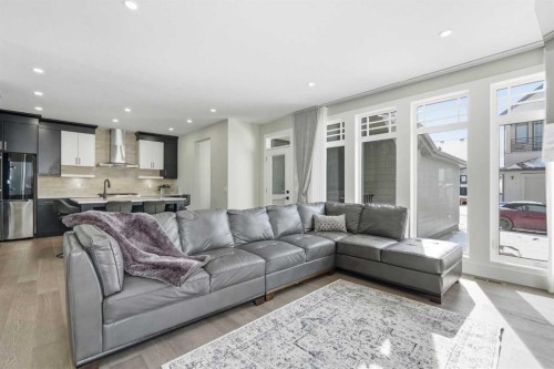 74 Alpine Gardens Sw, Calgary, AB - Indoor Photo Showing Living Room