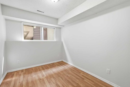 4-126 Mcrae Street, Okotoks, AB - Indoor Photo Showing Other Room