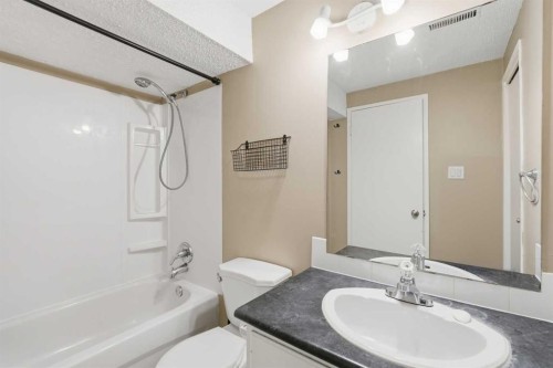 4-126 Mcrae Street, Okotoks, AB - Indoor Photo Showing Bathroom