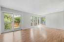 4-126 Mcrae Street, Okotoks, AB  - Indoor Photo Showing Living Room 
