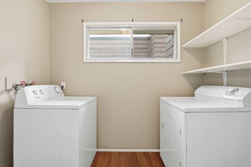 4-126 Mcrae Street, Okotoks, AB - Indoor Photo Showing Laundry Room