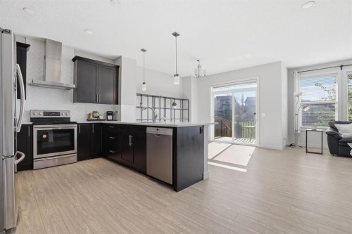 4 Heritage Terrace, Cochrane, AB - Indoor Photo Showing Kitchen With Stainless Steel Kitchen With Upgraded Kitchen