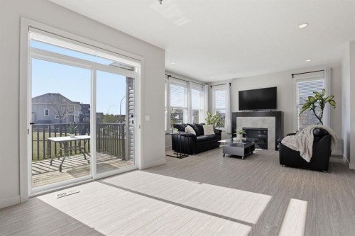 4 Heritage Terrace, Cochrane, AB - Indoor With Fireplace