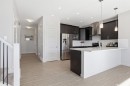 4 Heritage Terrace, Cochrane, AB  - Indoor Photo Showing Kitchen With Stainless Steel Kitchen With Upgraded Kitchen 