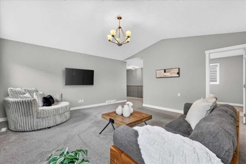 137 Cranbrook Cove Se, Calgary, AB - Indoor Photo Showing Living Room