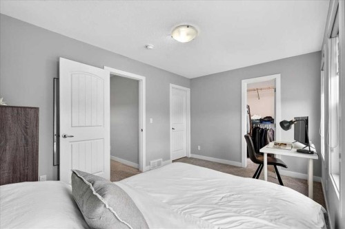 137 Cranbrook Cove Se, Calgary, AB - Indoor Photo Showing Bedroom