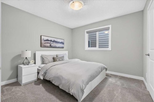 137 Cranbrook Cove Se, Calgary, AB - Indoor Photo Showing Bedroom