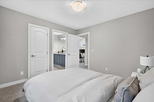 137 Cranbrook Cove Se, Calgary, AB - Indoor Photo Showing Bedroom