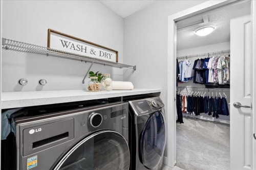 137 Cranbrook Cove Se, Calgary, AB - Indoor Photo Showing Laundry Room