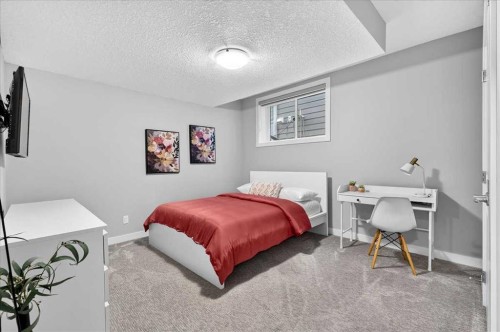 137 Cranbrook Cove Se, Calgary, AB - Indoor Photo Showing Bedroom