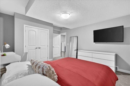 137 Cranbrook Cove Se, Calgary, AB - Indoor Photo Showing Bedroom