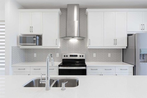 186 Aquila Drive Nw, Calgary, AB - Indoor Photo Showing Kitchen With Stainless Steel Kitchen With Upgraded Kitchen