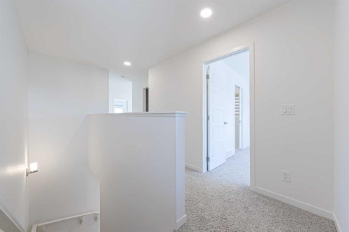 186 Aquila Drive Nw, Calgary, AB - Indoor Photo Showing Other Room