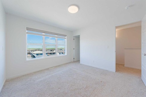 186 Aquila Drive Nw, Calgary, AB - Indoor Photo Showing Other Room