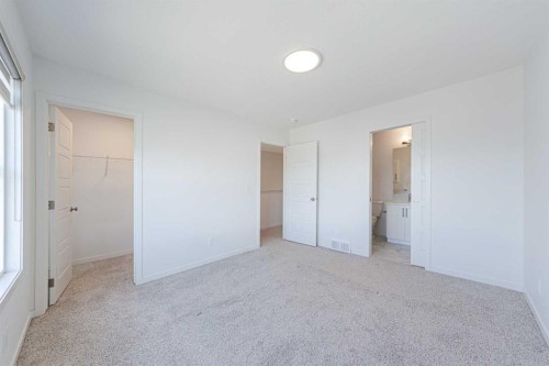 186 Aquila Drive Nw, Calgary, AB - Indoor Photo Showing Other Room