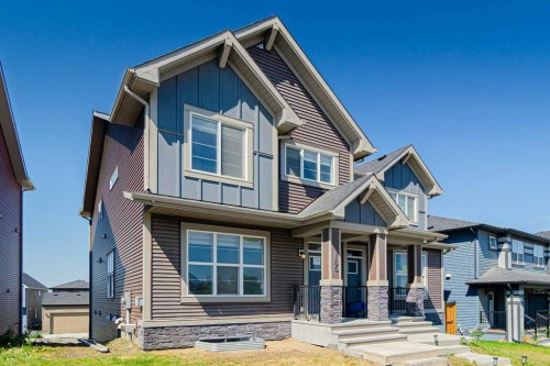 186 Aquila Drive Nw, Calgary, AB - Outdoor With Facade