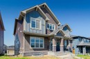 186 Aquila Drive Nw, Calgary, AB  - Outdoor With Facade 