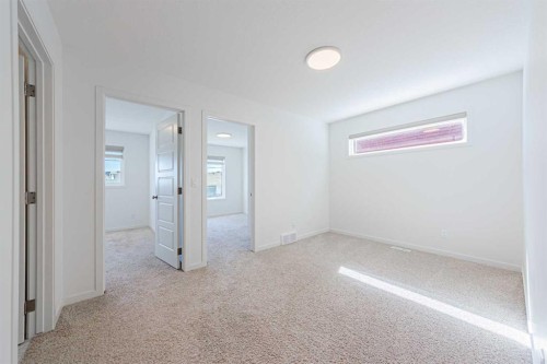 186 Aquila Drive Nw, Calgary, AB - Indoor Photo Showing Other Room