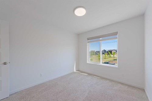 186 Aquila Drive Nw, Calgary, AB - Indoor Photo Showing Other Room