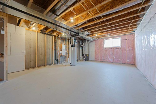 186 Aquila Drive Nw, Calgary, AB - Indoor Photo Showing Basement