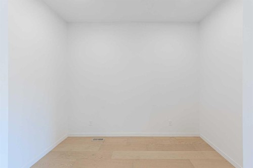 186 Aquila Drive Nw, Calgary, AB - Indoor Photo Showing Other Room