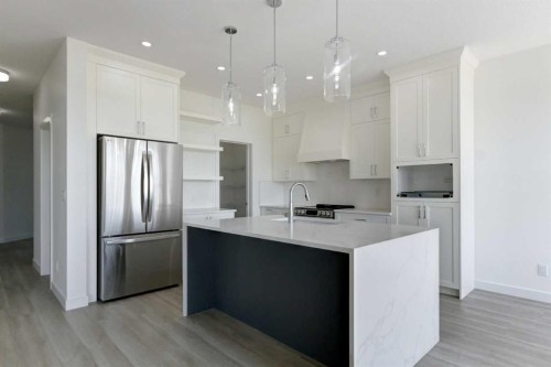 160 Copperhead Road Se, Calgary, AB - Indoor Photo Showing Kitchen With Upgraded Kitchen