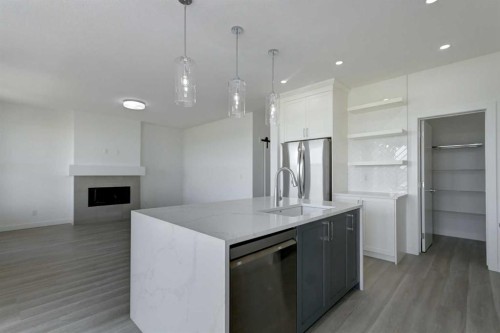 160 Copperhead Road Se, Calgary, AB - Indoor Photo Showing Kitchen With Upgraded Kitchen