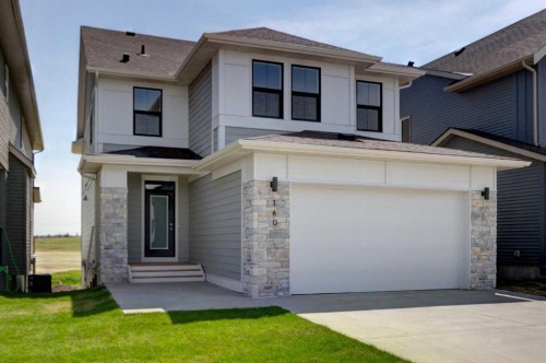 160 Copperhead Road Se, Calgary, AB - Outdoor With Facade