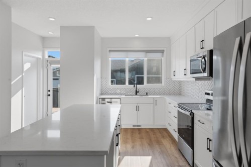 20305 45 Street Se, Calgary, AB - Indoor Photo Showing Kitchen With Stainless Steel Kitchen With Upgraded Kitchen
