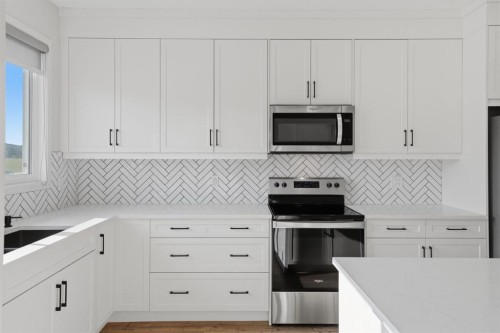 20305 45 Street Se, Calgary, AB - Indoor Photo Showing Kitchen With Stainless Steel Kitchen With Upgraded Kitchen